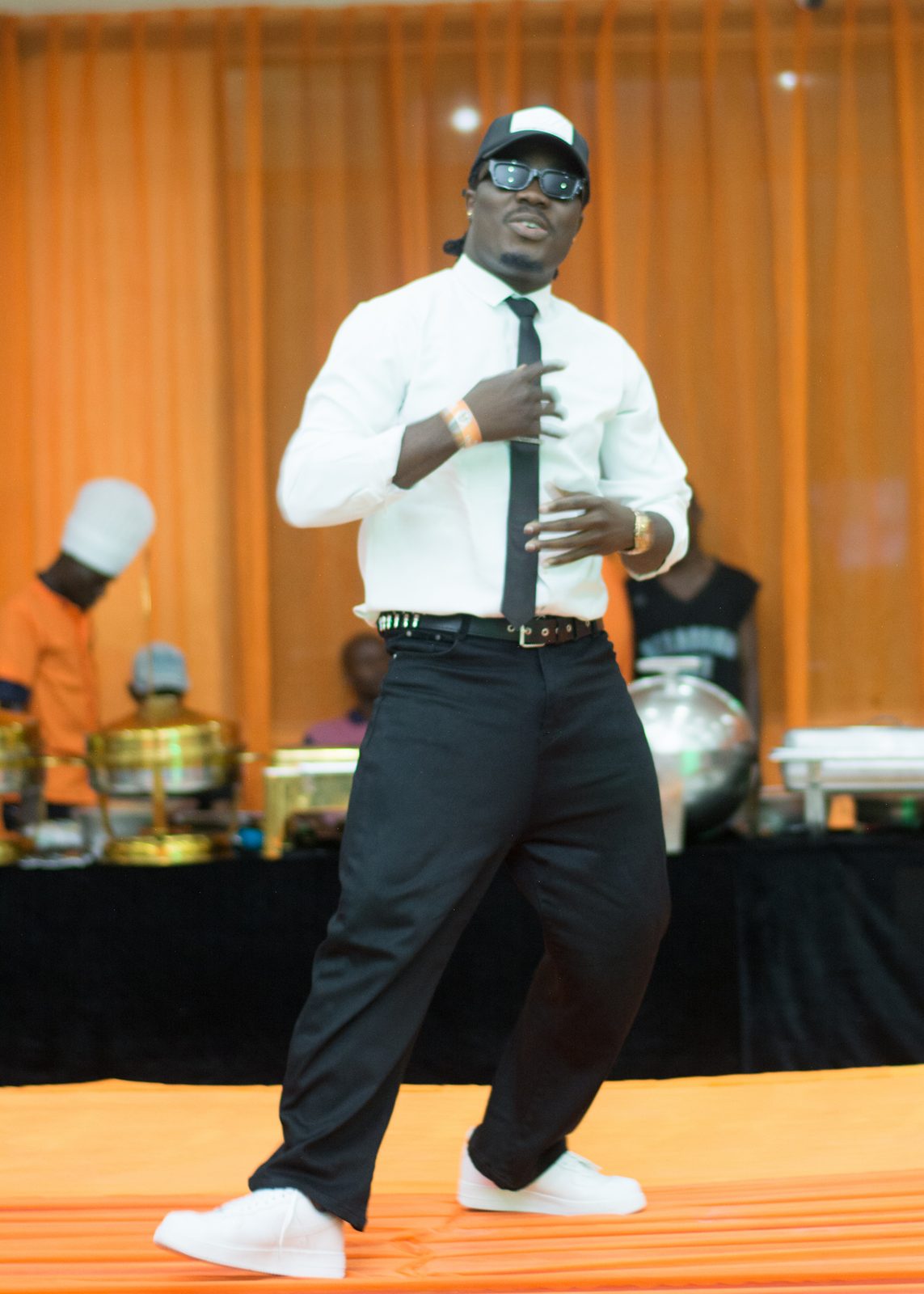 A guest striking a pose on the stage